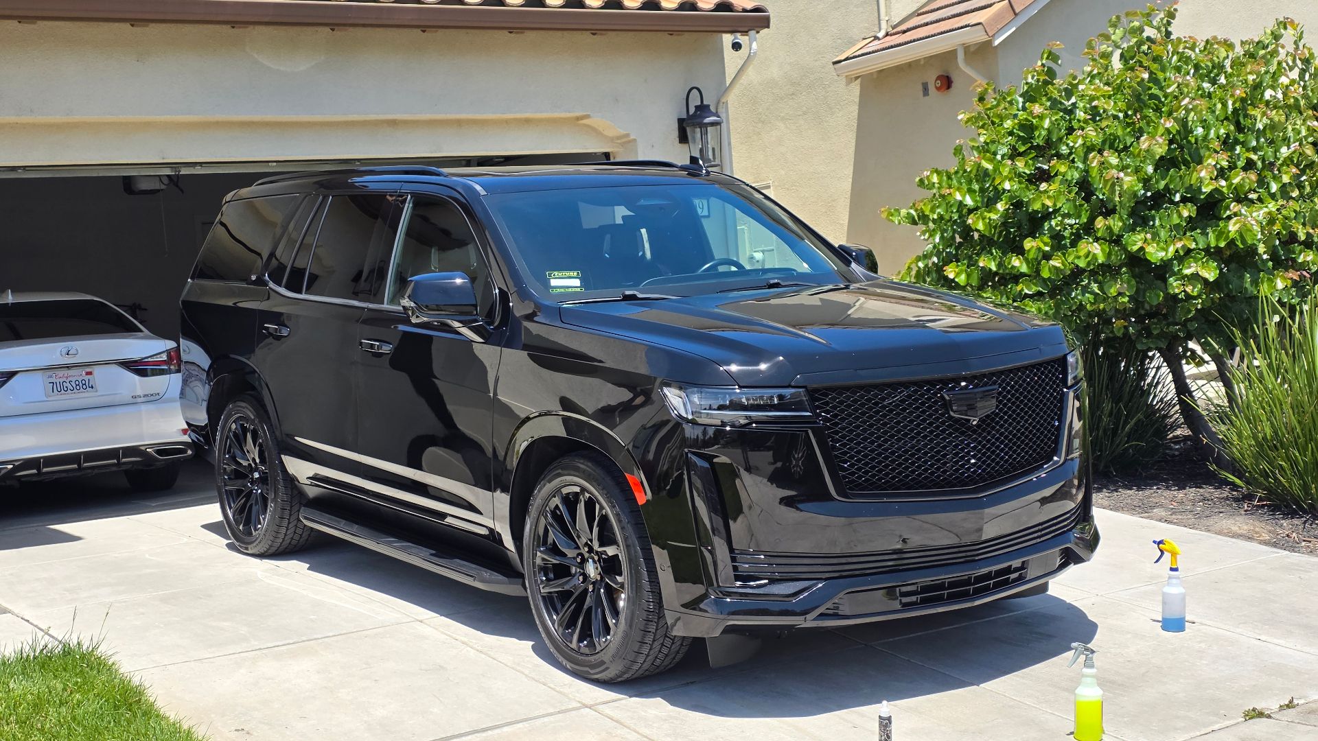 Blacked-out Cadillac Escalade detailed to a mirror gloss by Super Shine Mobile Detailing